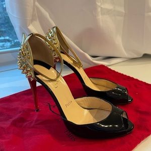 Christian Louboutin black and gold spiked pumps